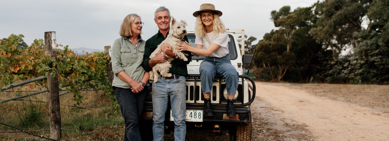 Grampians Estate owners with their dog at the vineyard